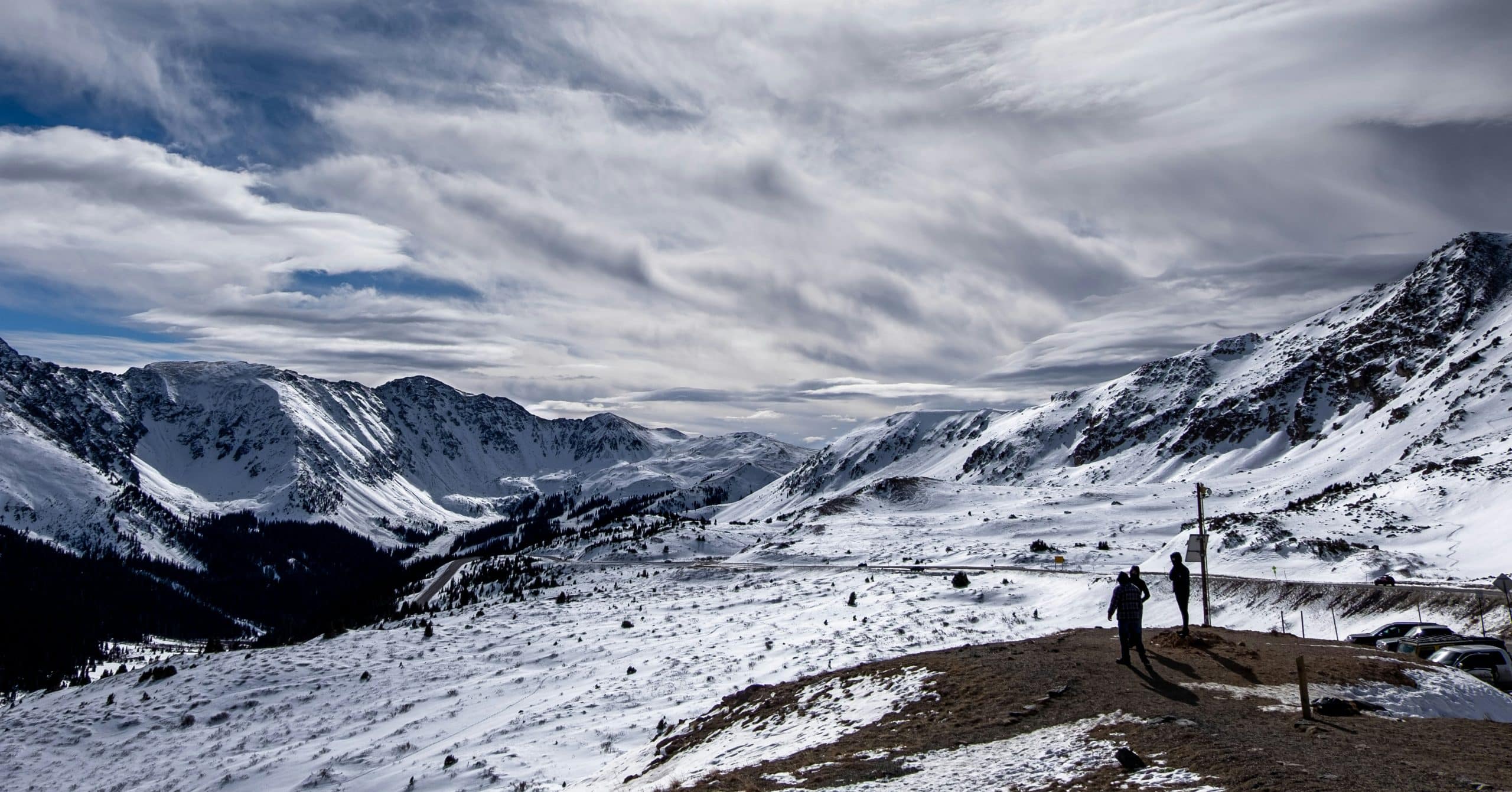 Snow covered mountain landscape near Loveland, Colorado, beneath dramatic winter clouds